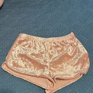 Pink velvet material booty shorts